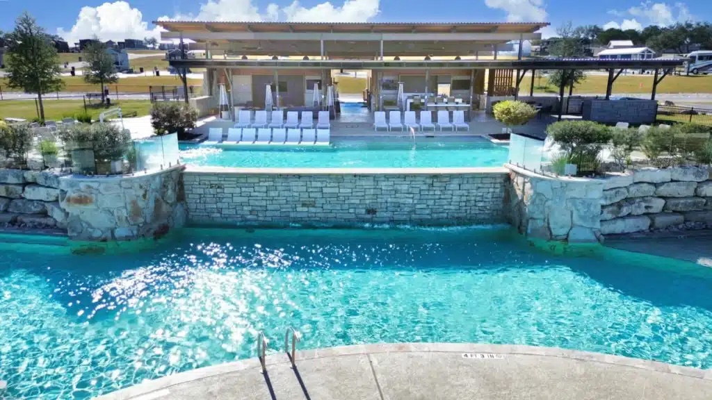 Aerial view of the pool, pavilion and outdoor kitchen